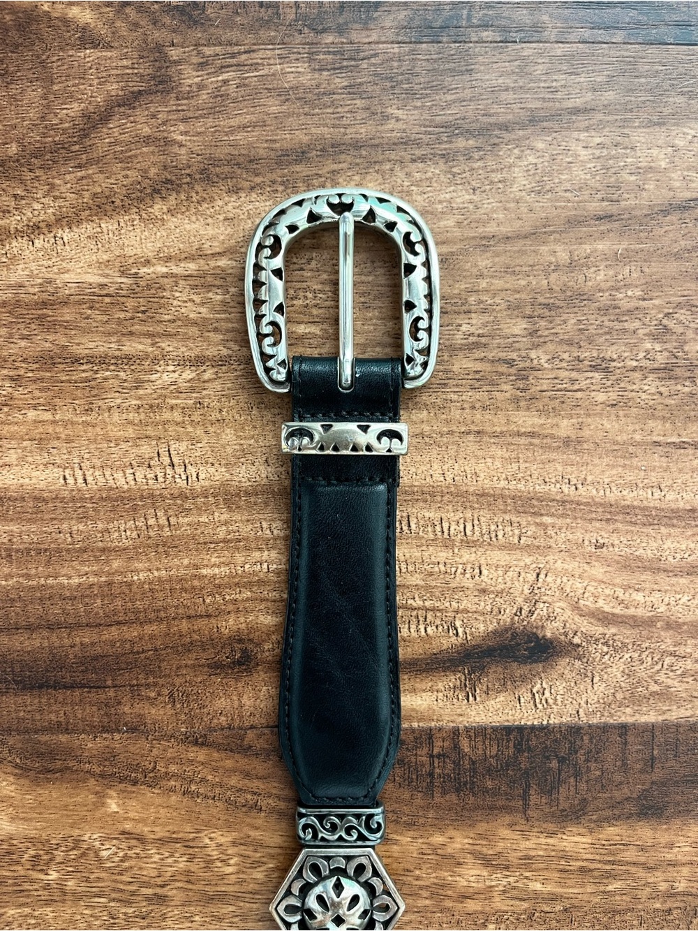 Black Leather Belt with Decorative Silver Buckle